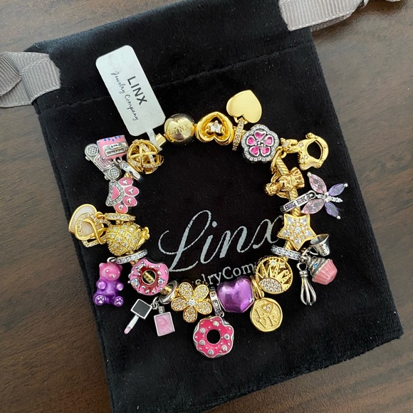 Linx Yellow Gold Bracelet with Gold Purple and Pink Themed Charms